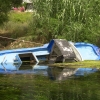Submerged Boat in the River